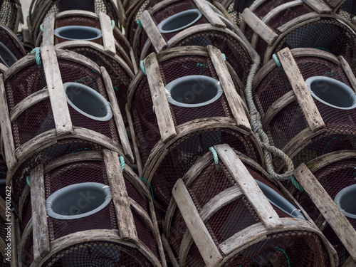 Ribadeo, Galicia, Spain. Close up view of row of octopus traps in the harbour.