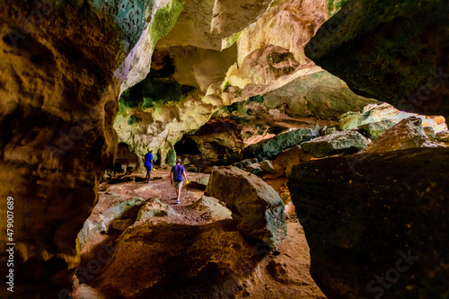 People exploring sea caves on North Caicos, Turks and Caicos Islands, Atlantic, Central America photo