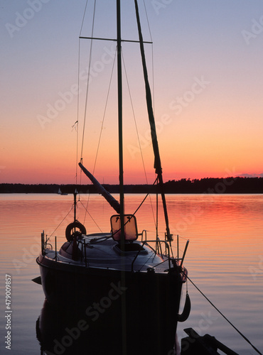 Fototapeta Naklejka Na Ścianę i Meble -  Beldany Lake, sail boat in Piaski marina, Masuria region, Poland