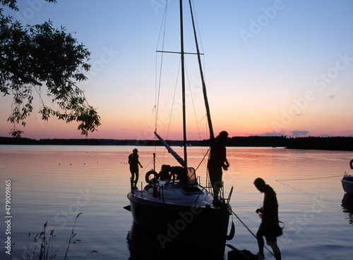 Fototapeta Naklejka Na Ścianę i Meble -  Beldany Lake, sail boat in Piaski marina, Masuria region, Poland