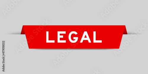 Red color inserted label with word legal on gray background