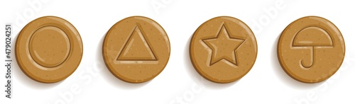 Set of Korean dalgona candy with triangle, star, circle and umbrella.