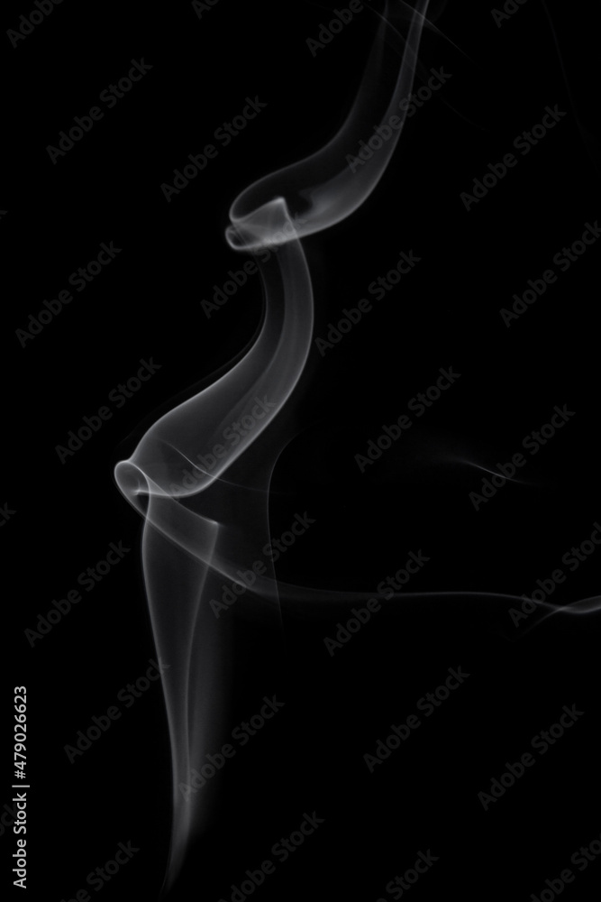 wax candle with burning wick and smoke, isolated on a black background wax candle with burning wick and smoke, isolated on a black background
