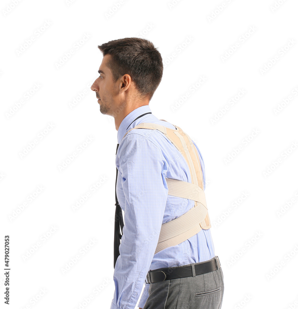 Businessman in back brace on white background Businessman in back brace on white background