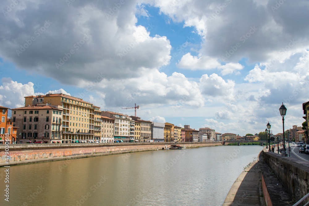 Pisa, Italy, September 2015, embankment of the Arno river in Pisa with colorful houses