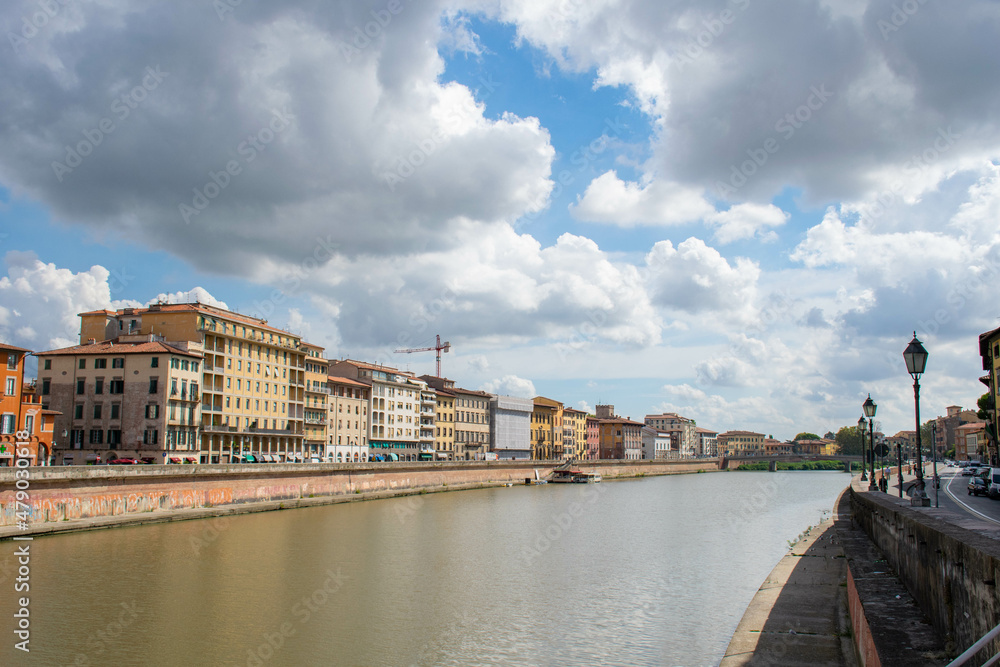 Fototapeta premium Pisa, Italy, September 2015, embankment of the Arno river in Pisa with colorful houses