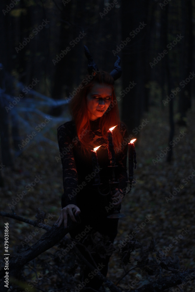Naklejka premium witch in the dark forest