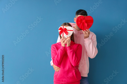 Happy young couple with gif...