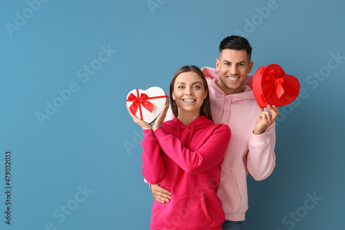 Happy young couple with gif...