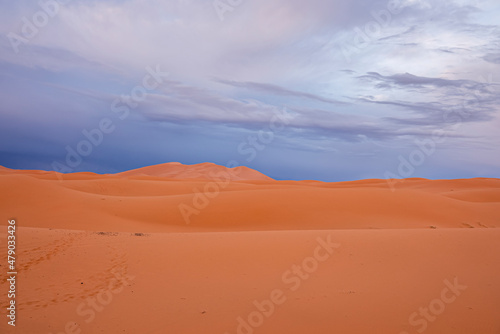 Beautiful view of sand dunes in sahara desert against cloudy sky, Sand dunes with imprints in desert