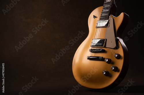 Gold electric guitar photo