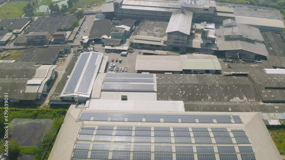 Aerial top view of factory industry. Electricity tower building in energy, transportation, logistic or environment concept. Manufacturing workshop station.