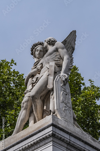 Sculpture from white Carrara marble at Palace Bridge (Schlossbrucke, built in 1824) is between Palace Square (Schlossplatz) and famous avenue Unter den Linden. Berlin, Germany. photo