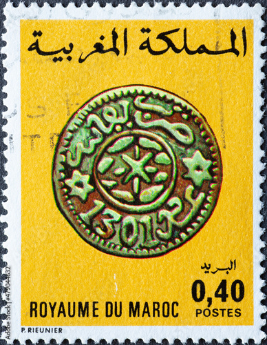 Morocco - circa 1976: A post stamp from the Morocco showing a Moroccan Coins Fez Coin of 1883/4