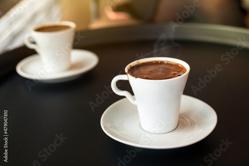 two cups of coffee on the table in cafe 