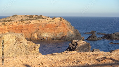 Spanish coastline red rock cliff overlooking the sea Cape Palos, Cartagena, Murcia region, Spain. Tourist attraction, place to visit