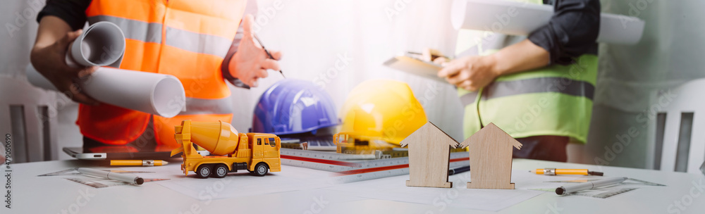 engineer working in office with blueprints, inspection in workplace for architectural plan, construction project ,Business construction engineer working in office with blueprints, inspection in workplace for architectural plan, construction project ,Business construction