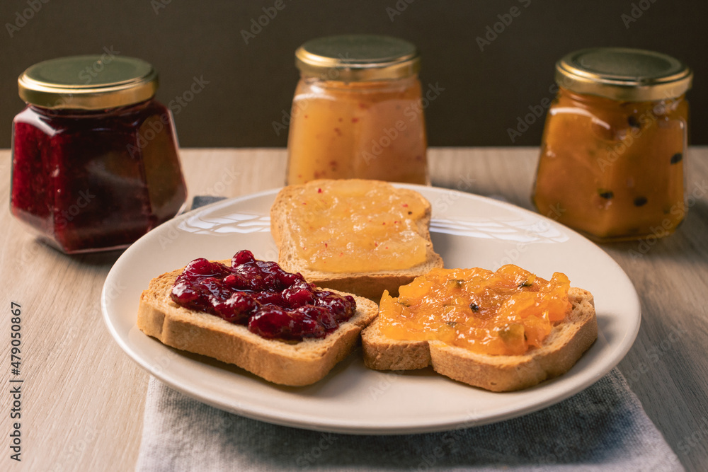 Breakfast toast with strawberry and passion fruit jam Breakfast toast with strawberry and passion fruit jam