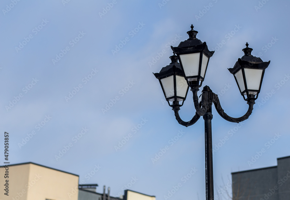 Street lamp on blurred sky background