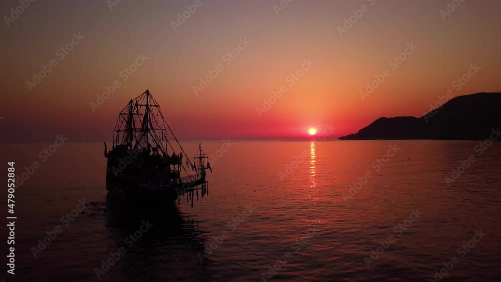 Tourist Pirate ship at the Mediterranean sea at sunset, Alanya, Turkey Tourist Pirate ship at the Mediterranean sea at sunset, Alanya, Turkey