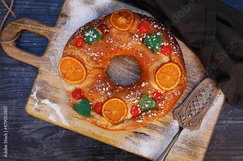 Roscon de reyes. Traditional Spanish holiday dessert served on January 6th photo