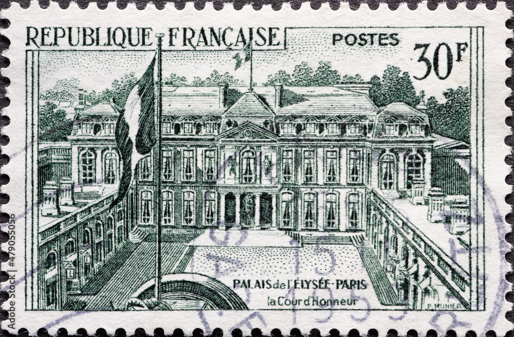 France - circa 1959: A post stamp from France showing the building of the Palais of Elysee, Paris with the French flag