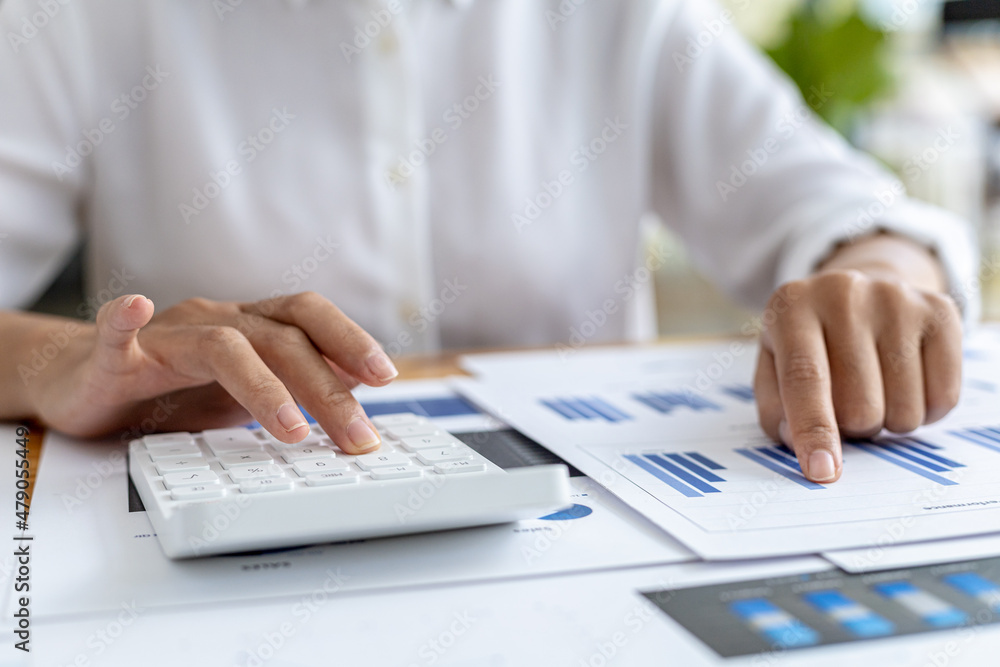 The company's finance manager is using a calculator, he uses a calculator to calculate the numbers in the company's financial documents that employees in the department create as meeting documents. The company's finance manager is using a calculator, he uses a calculator to calculate the numbers in the company's financial documents that employees in the department create as meeting documents.