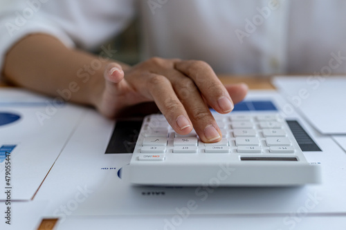 The company's finance manager is using a calculator, he uses a calculator to calculate the numbers in the company's financial documents that employees in the department create as meeting documents.