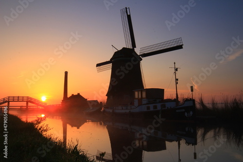 dutch windmill at sunset