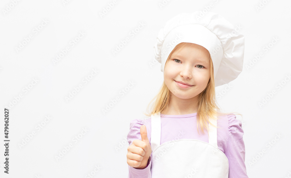 Beautiful little girl in chef uniform isolated on white Beautiful little girl in chef uniform isolated on white