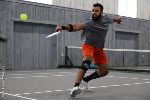 pickleball backhand during a match