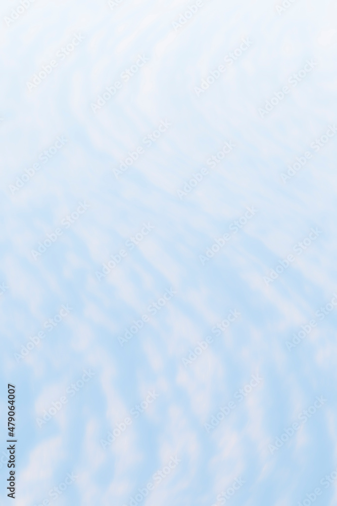 Smooth and blurred white and light blue snow in S-shape. Abstract high resolution full frame background, copy space.