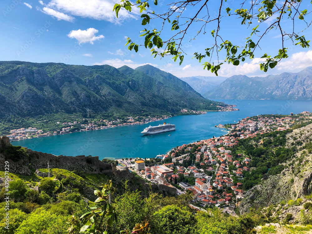 Bay of Kotor, Montenegro with cruise ship, fjord and Kotor old town from top