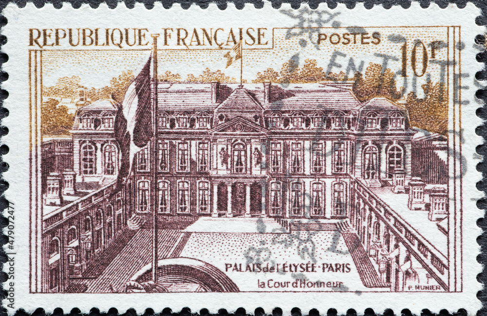 France - circa 1957: A post stamp from France showing the building of the Palais de l'Elysée, Paris with the French flag