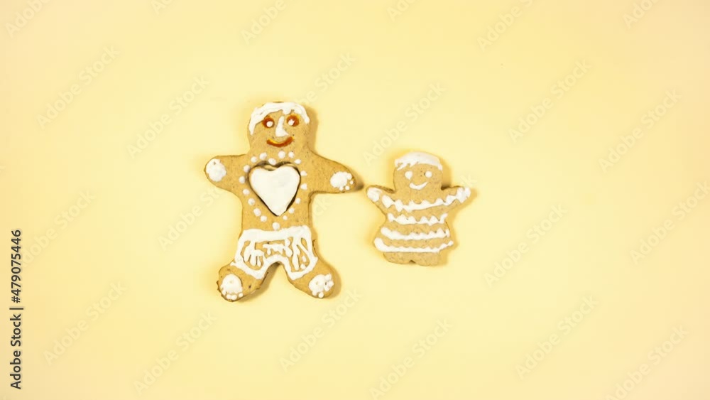 4k Meeting of two gingerbread man. The story of a stolen heart. Creative concept of love and lovers. Happy Valentine's Day. Gingerbread made by children. Stop motion animation. Yellow backgdound. 4k Meeting of two gingerbread man. The story of a stolen heart. Creative concept of love and lovers. Happy Valentine's Day. Gingerbread made by children. Stop motion animation. Yellow backgdound.