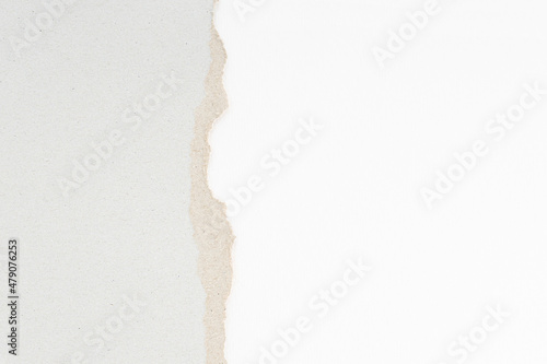 Abstract background with ripped Recycled cardboard and white textured paper. Paper texture template