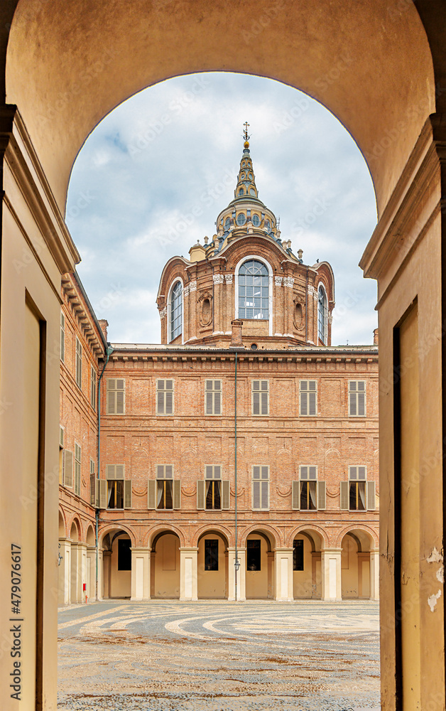 Turin, Italy, View of the courtyard of the Royal Palace of Savoy and the Chapel of the Holy Shroud through the arch.