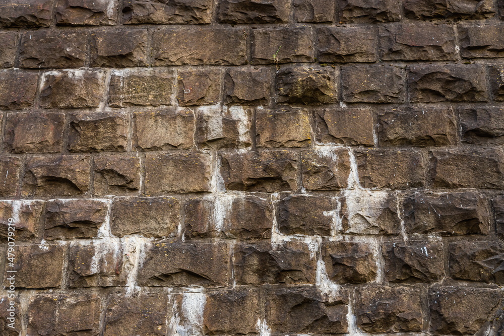 Very old stone masonry of the railway bridge