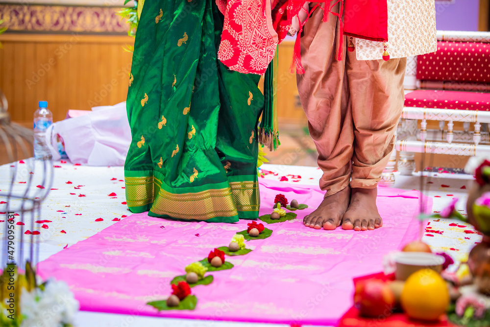 Indian Hindu wedding ceremony ritual items, hands and feet close up