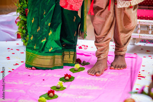 Indian Hindu wedding ceremony ritual items, hands and feet close up