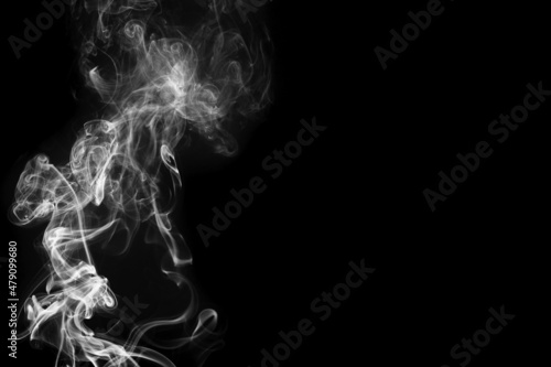 Fototapeta Naklejka Na Ścianę i Meble -  白い煙と黒背景