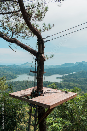 The Amazing Kalibiru tourism, a large reservoir surrounded by lush trees has become one of the popular tourist destinations in Indonesia photo