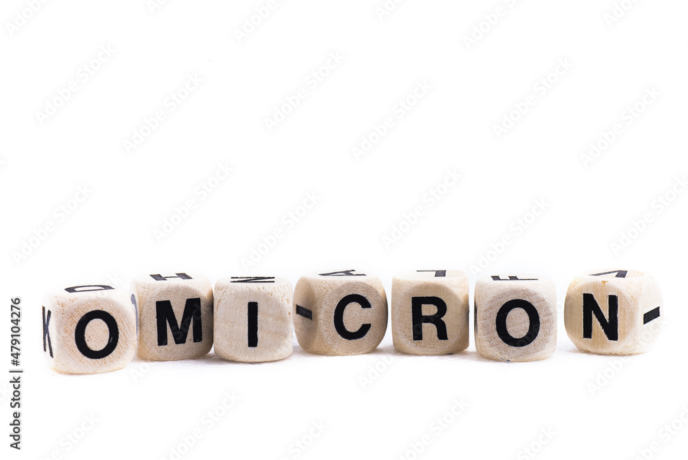 The word OMICRON is formed from bone cubes. concept, new virus (COVID-19) The word OMICRON is formed from bone cubes. concept, new virus (COVID-19)