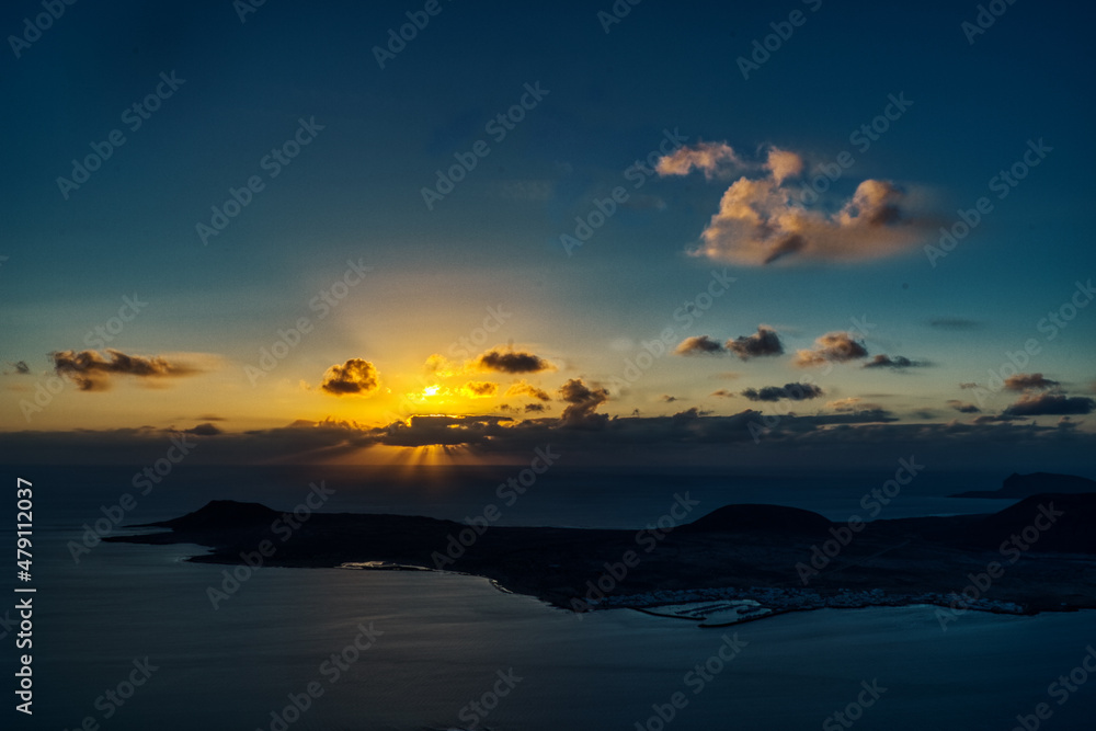 sunset over the island in the sea