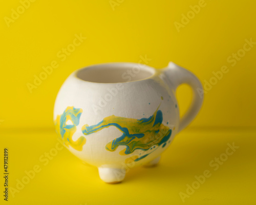 handmade ceramic mug with interesting design