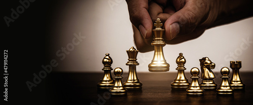 Fotografie, Obraz Close up king chess challenge or battle fighting on chess board concepts of leadership and strategy or strategic plan and human resource or risk management or team player