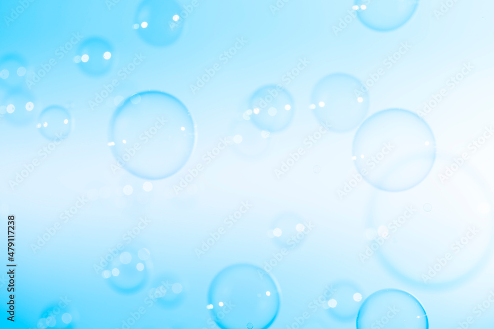 Beautiful Transparent Blue Soap Bubbles on White Background	