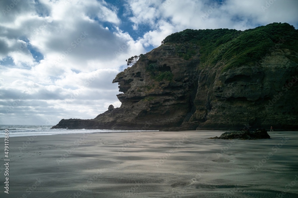 View of south side of Kaiwhare Point cliff from Piha Blowhole entrance