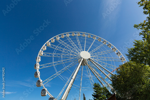 The White Ferris Wheel Over Blue Sky