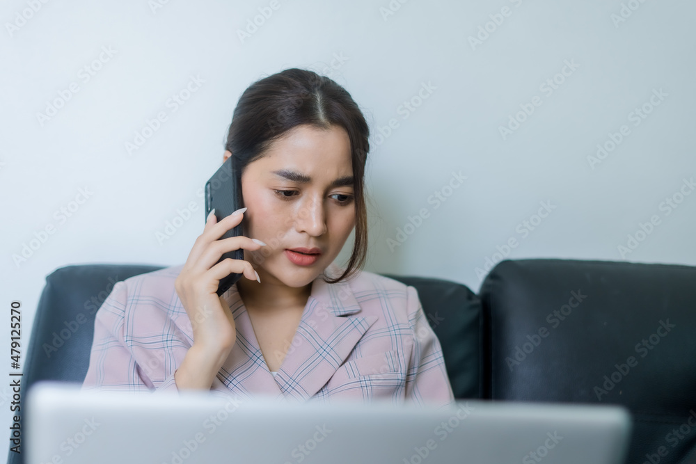 businesswoman talking on the phone in office businesswoman talking on the phone in office